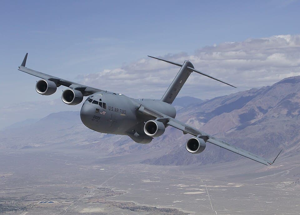 A U.S. Air Force C-17 Globemaster III T-1 flies over Owens Valley, California, for a test sortie. Edwards Air Force Base, California, welcomed home the aircraft